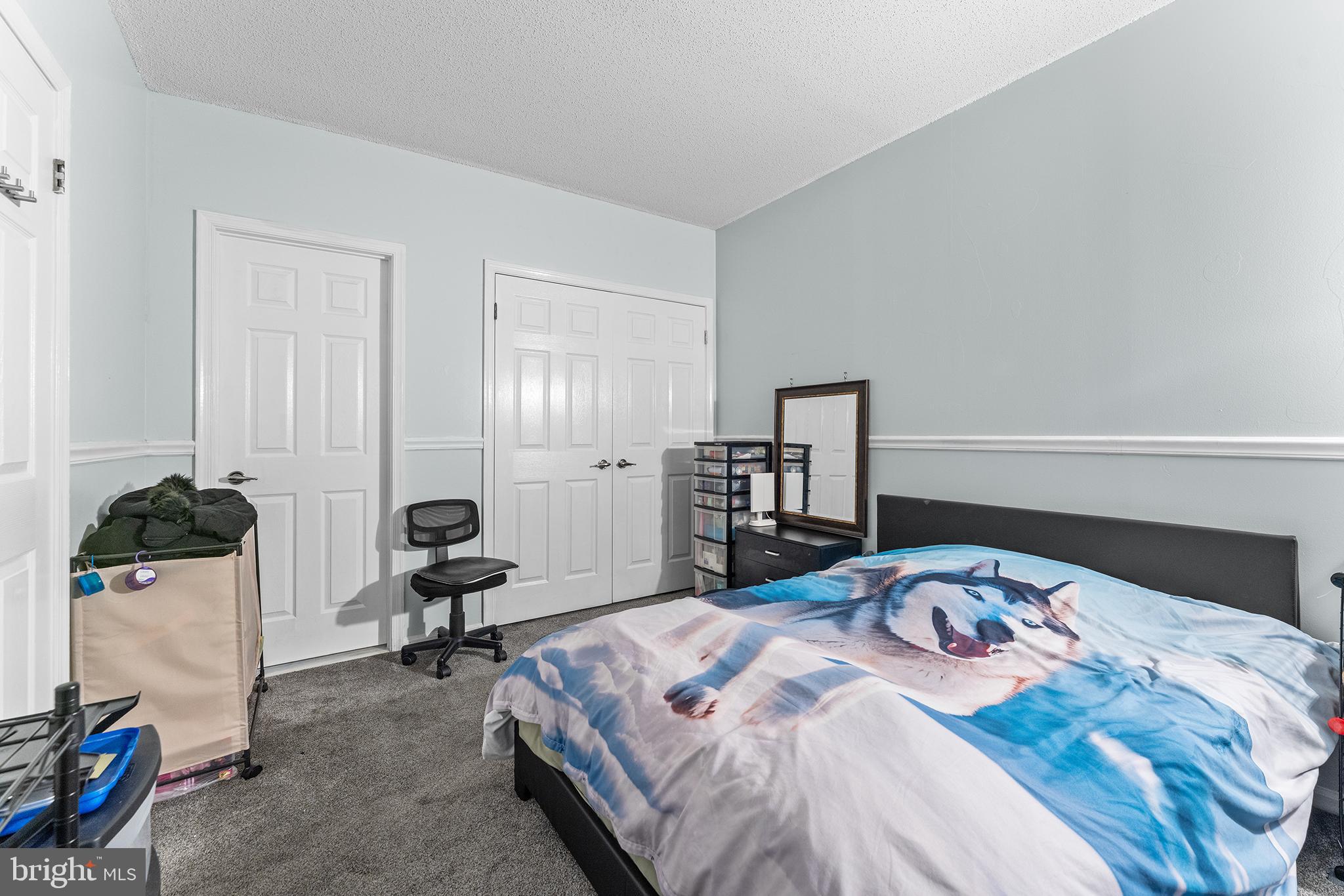 6070 Main Street Voorhees, NJ 08043 - Photo 9 of 22 a bedroom with a bed and furniture