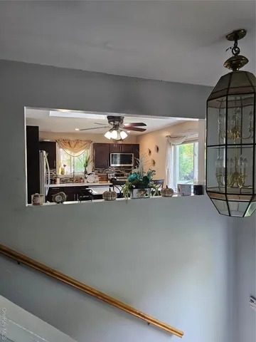 a view of a living room with furniture