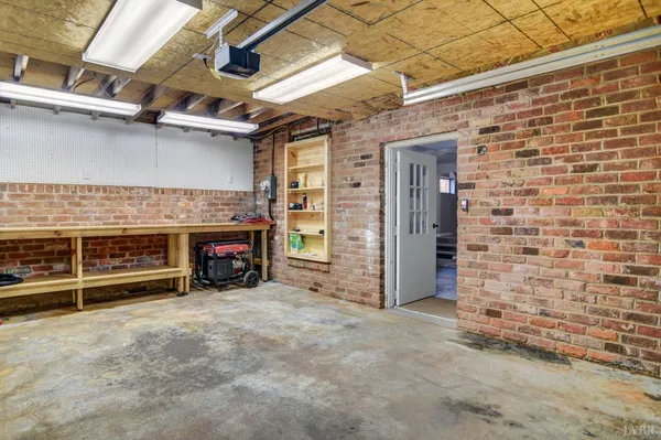 a view of an empty room with a fireplace