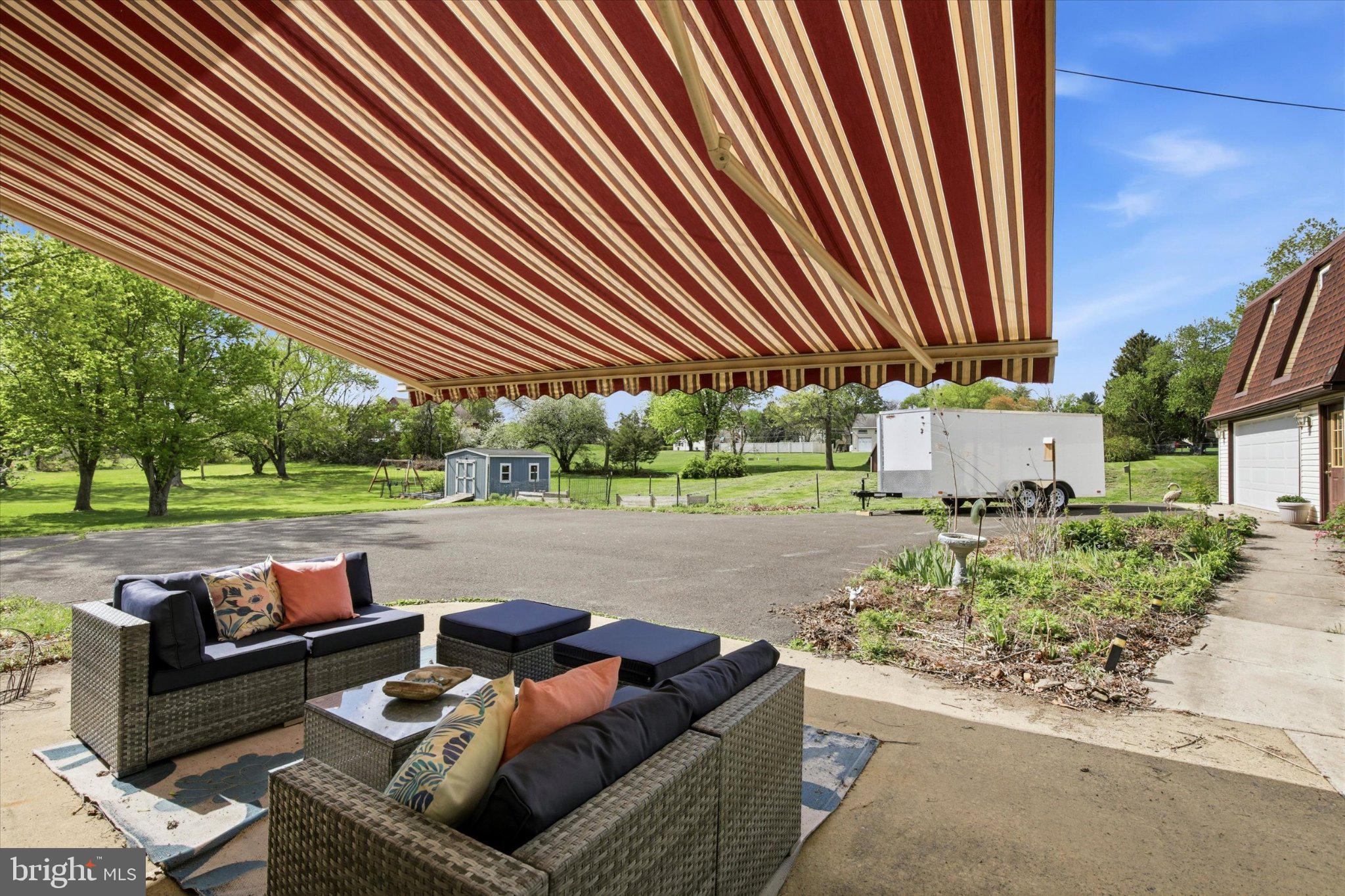 3386 Bristol Road Chalfont, PA 18914 - Photo 27 of 35 Charming outdoor retreat with awning.
