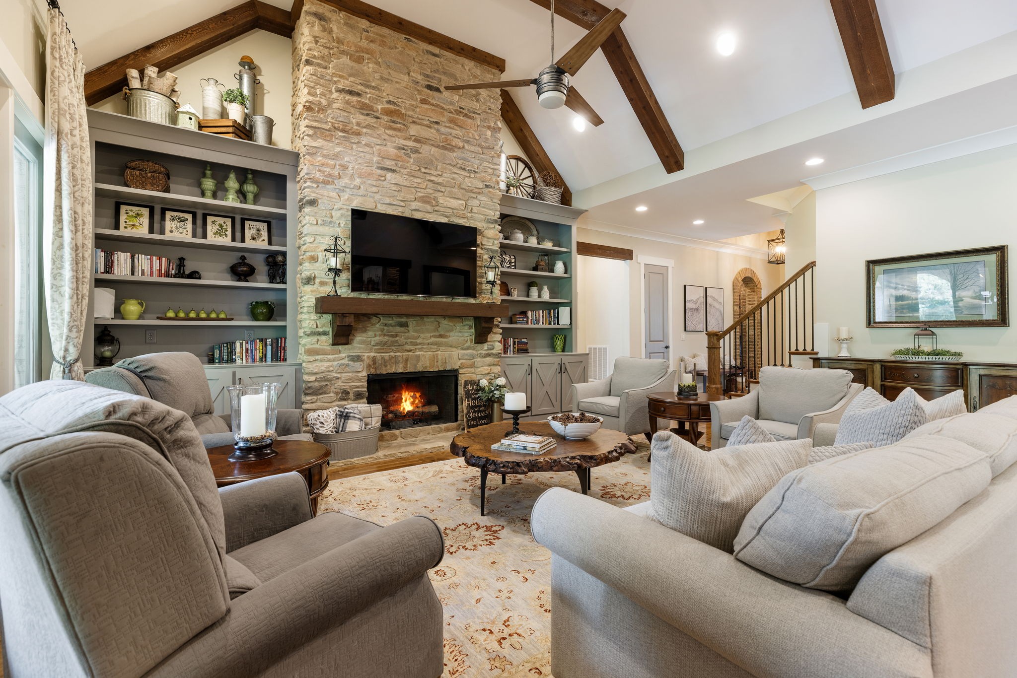 641 Legends Crest Drive Franklin, TN 37069 - Photo 13 of 99 a living room with furniture a fireplace and a flat screen tv