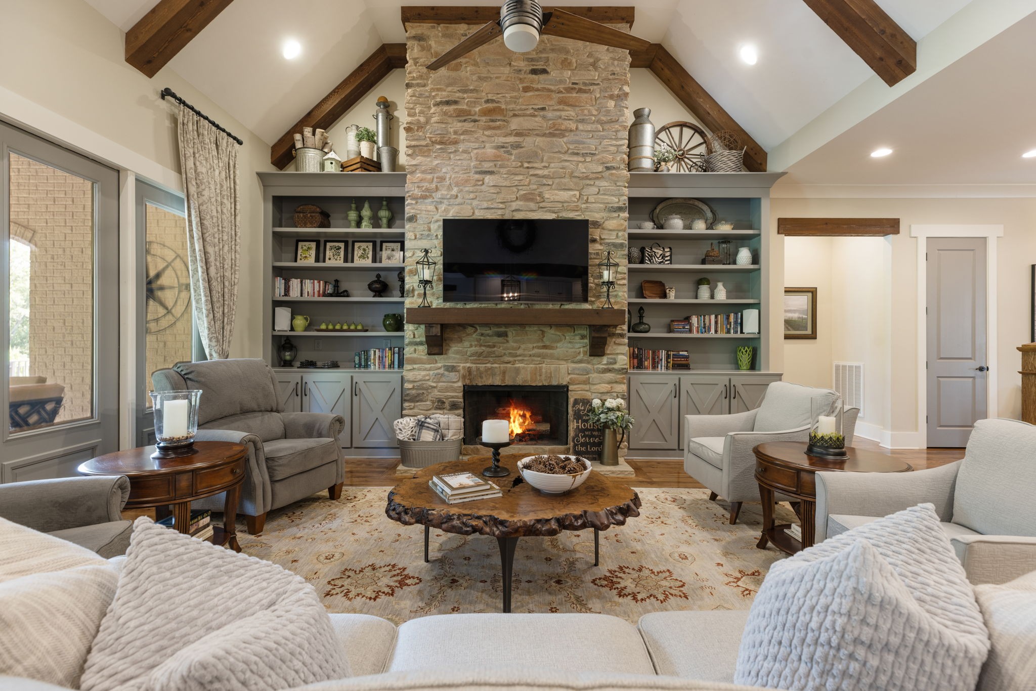 641 Legends Crest Drive Franklin, TN 37069 - Photo 15 of 99 a living room with furniture a fireplace and a large window