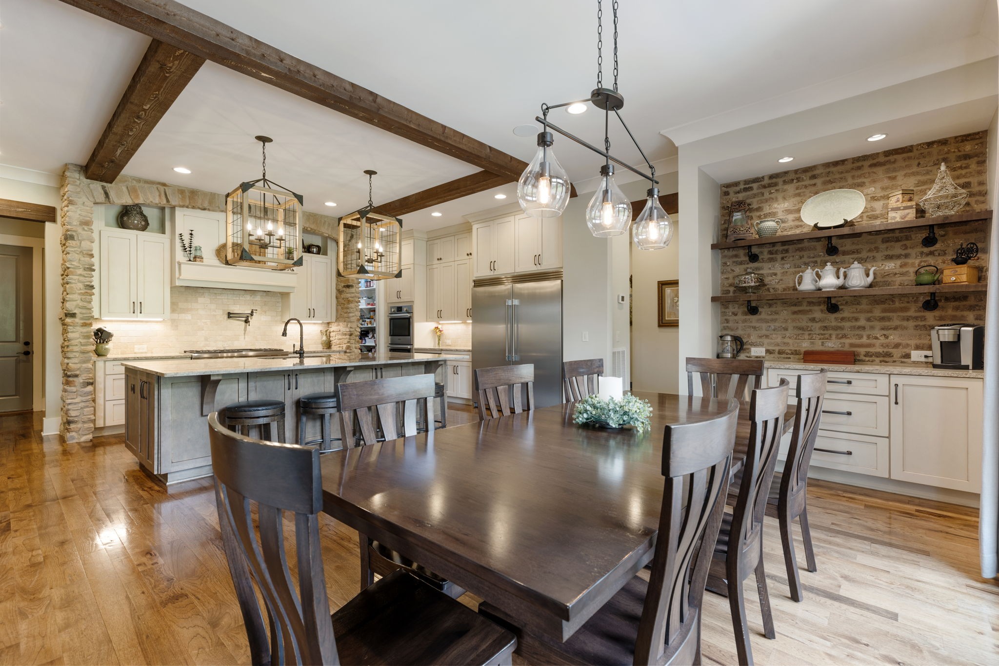 641 Legends Crest Drive Franklin, TN 37069 - Photo 20 of 99 a dining room with stainless steel appliances kitchen island a table and chairs
