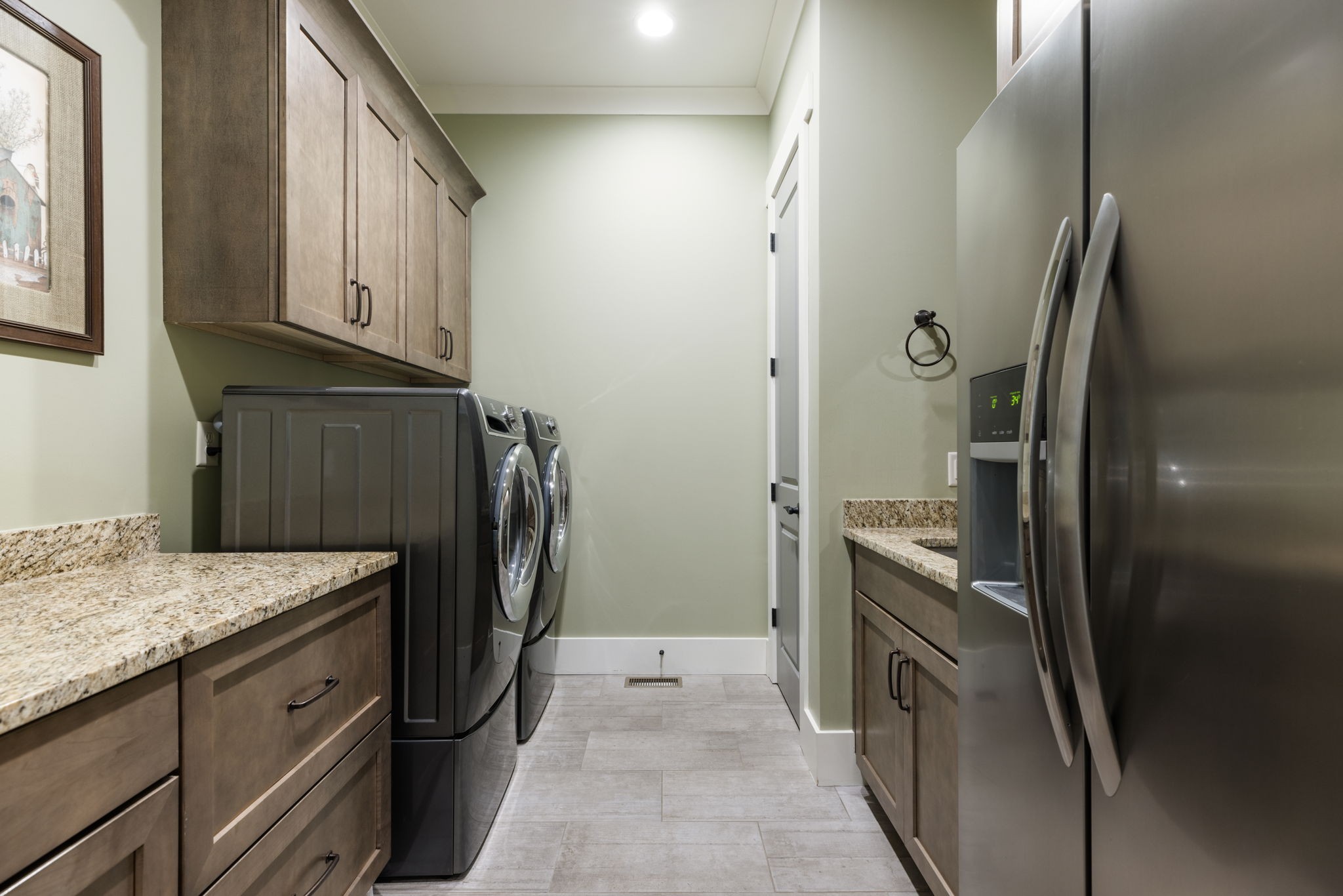 641 Legends Crest Drive Franklin, TN 37069 - Photo 25 of 99 a kitchen with stainless steel appliances granite countertop a refrigerator and a sink