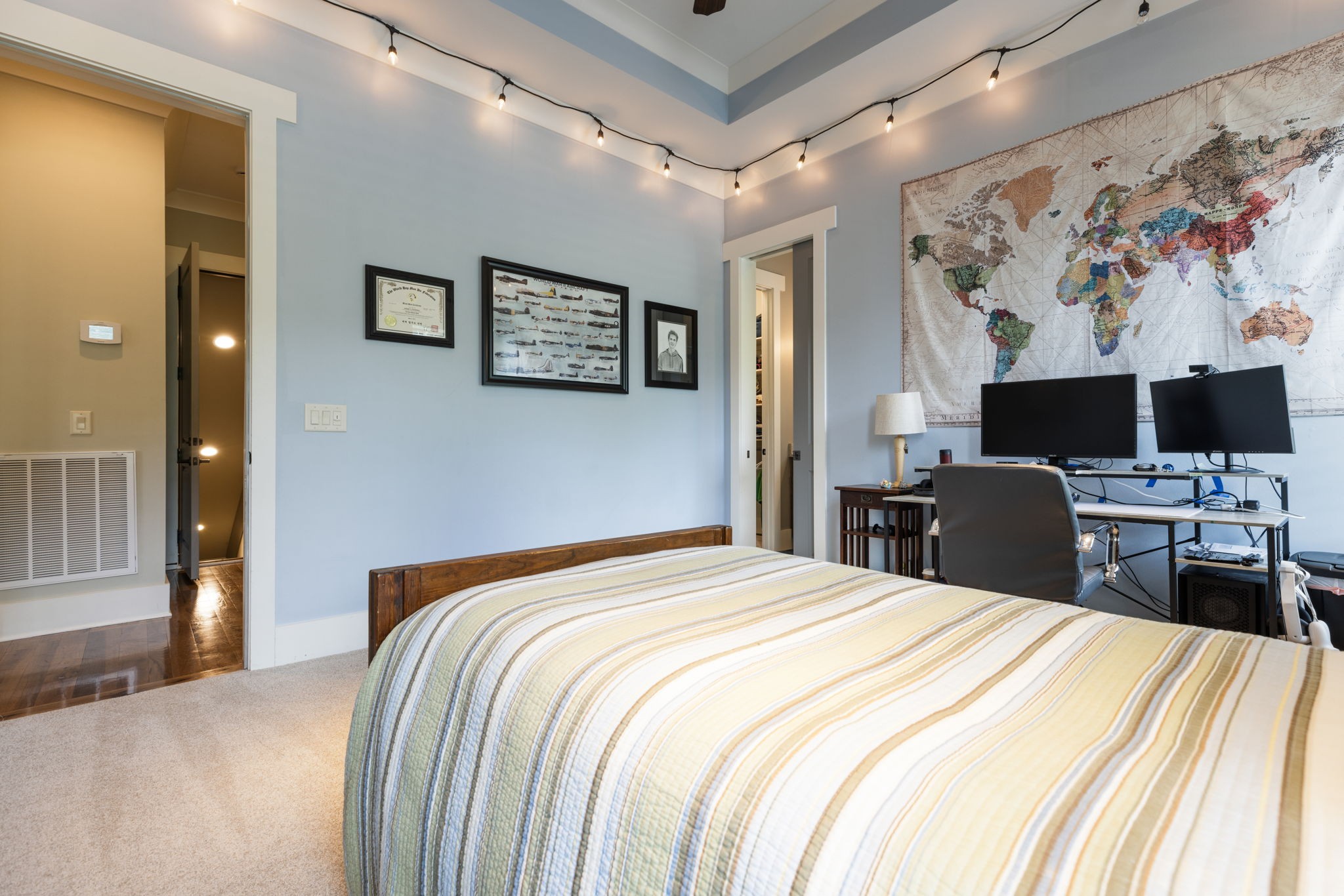 641 Legends Crest Drive Franklin, TN 37069 - Photo 36 of 99 a bedroom with a bed and a flat screen tv