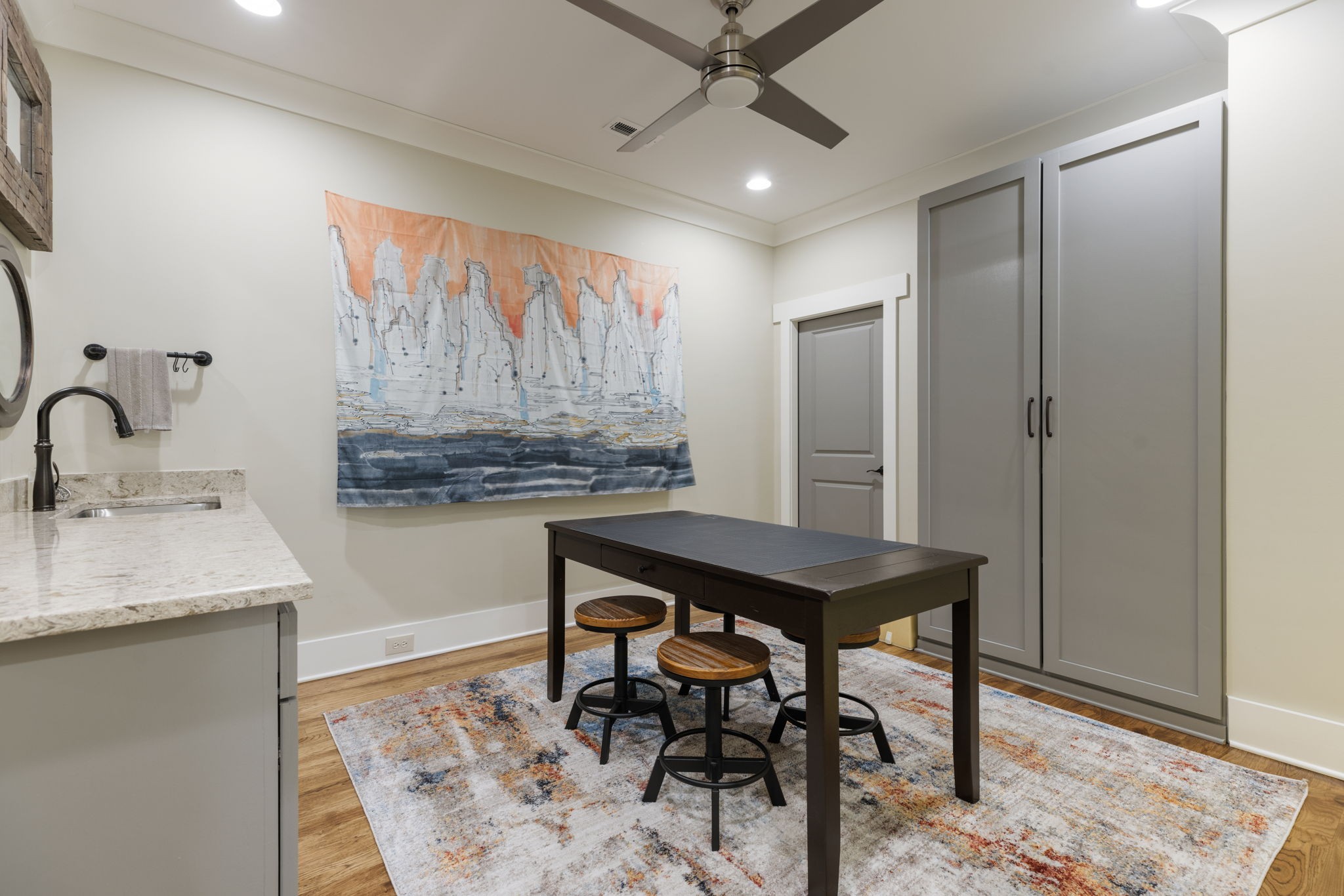 641 Legends Crest Drive Franklin, TN 37069 - Photo 46 of 99 a kitchen with stainless steel appliances kitchen island a table and chairs in it