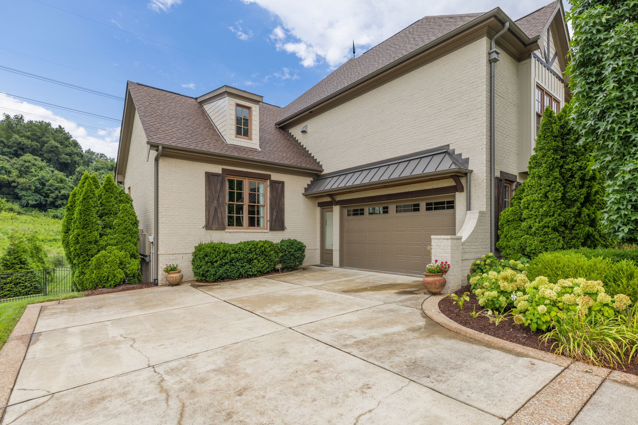 641 Legends Crest Drive Franklin, TN 37069 - Photo 69 of 99 a front view of a house with garden