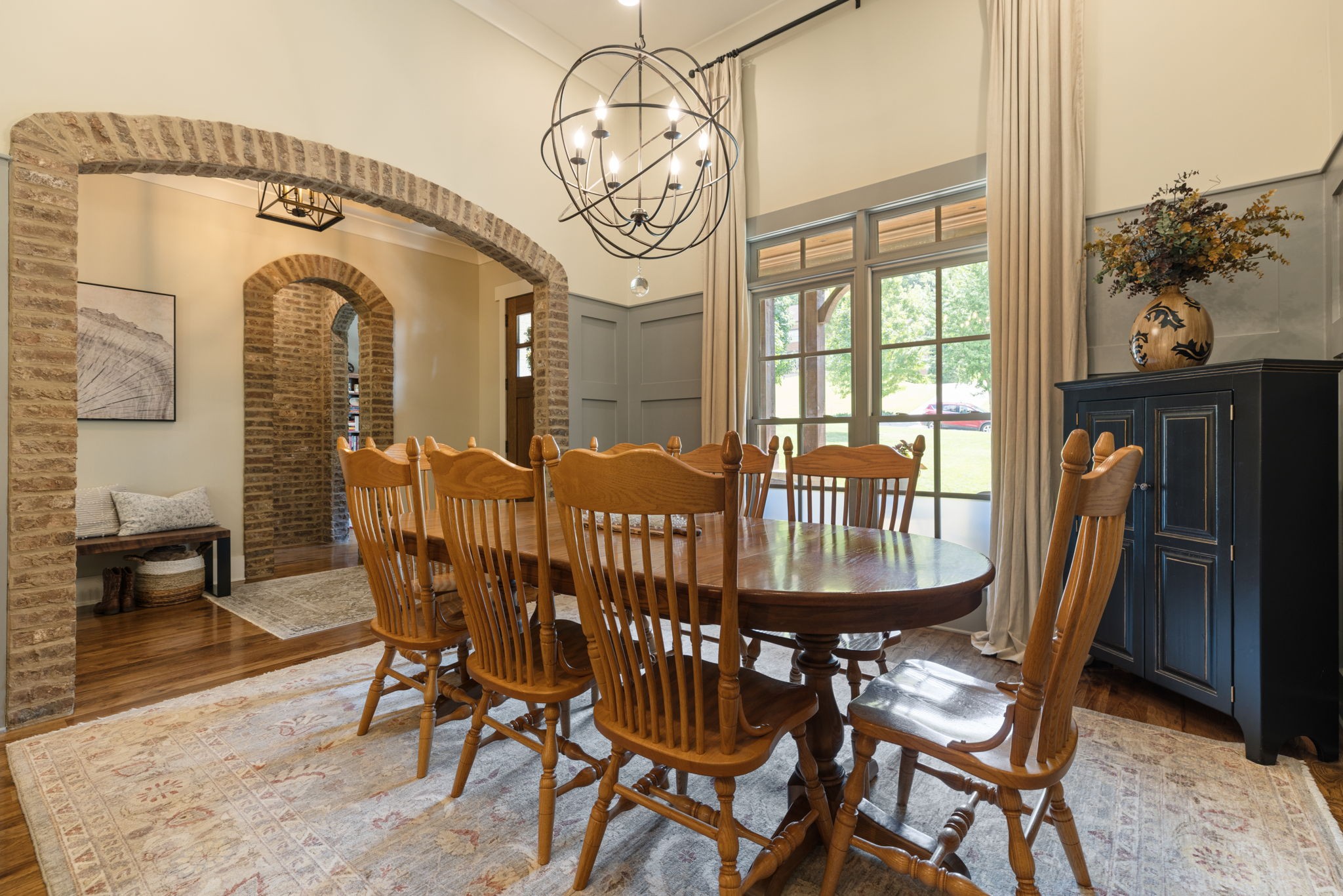 641 Legends Crest Drive Franklin, TN 37069 - Photo 7 of 99 a view of a dining room with furniture window and wooden floor