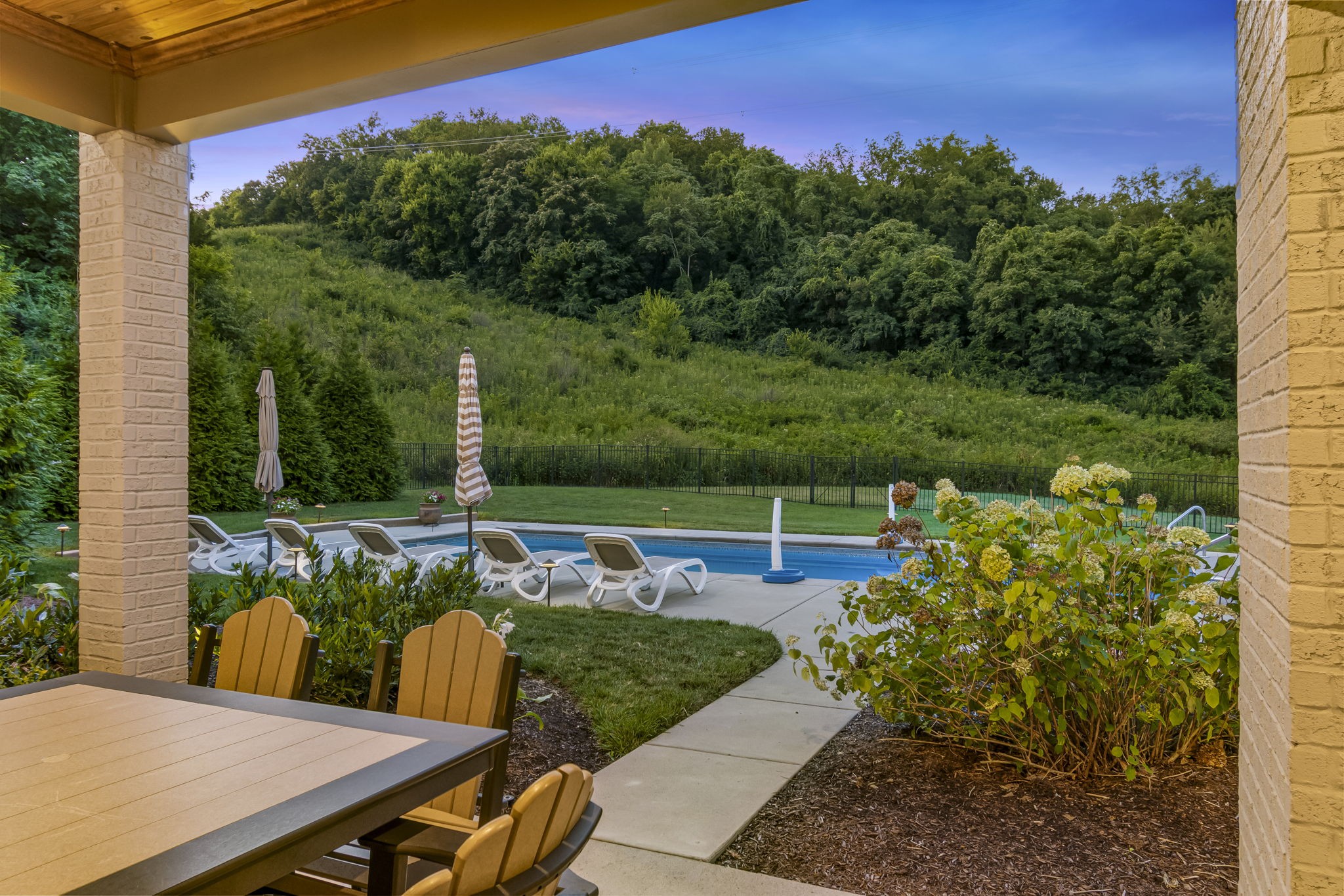 641 Legends Crest Drive Franklin, TN 37069 - Photo 77 of 99 a view of a chairs and table in the patio
