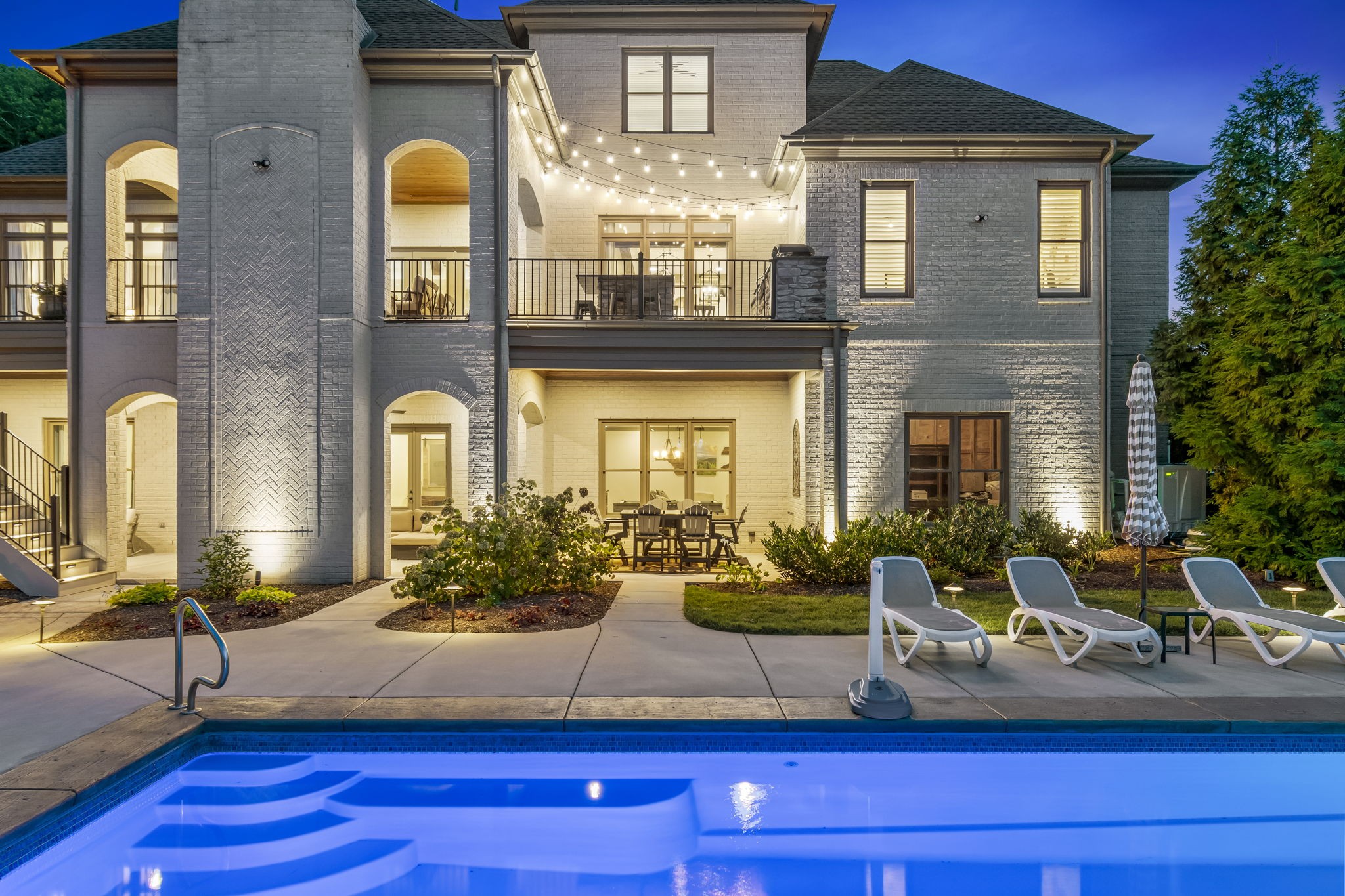 641 Legends Crest Drive Franklin, TN 37069 - Photo 87 of 99 a front view of a house with lots of yellow lighting