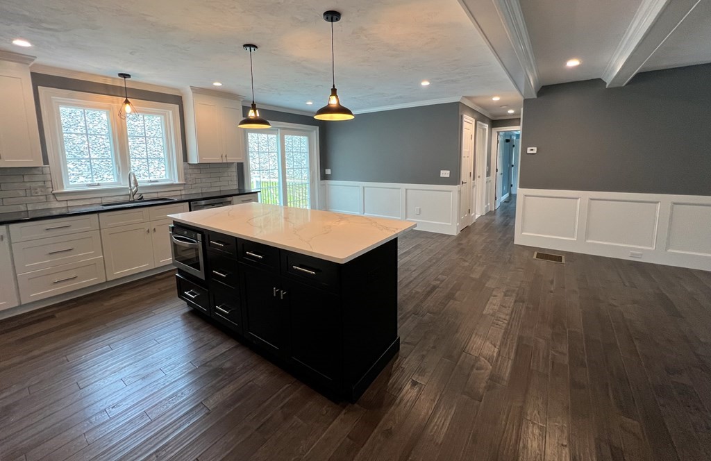 242 East County Road Rutland, MA 01543 - Photo 12 of 35 a room with wooden floors and wooden floors