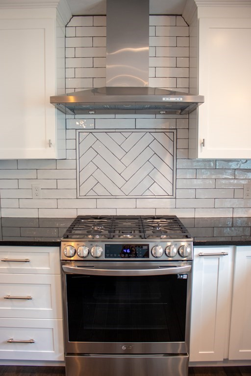 242 East County Road Rutland, MA 01543 - Photo 16 of 35 a stove top oven sitting inside of a kitchen