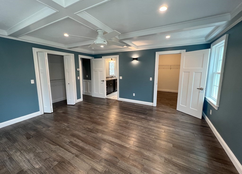 242 East County Road Rutland, MA 01543 - Photo 21 of 35 an empty room with wooden floor and windows