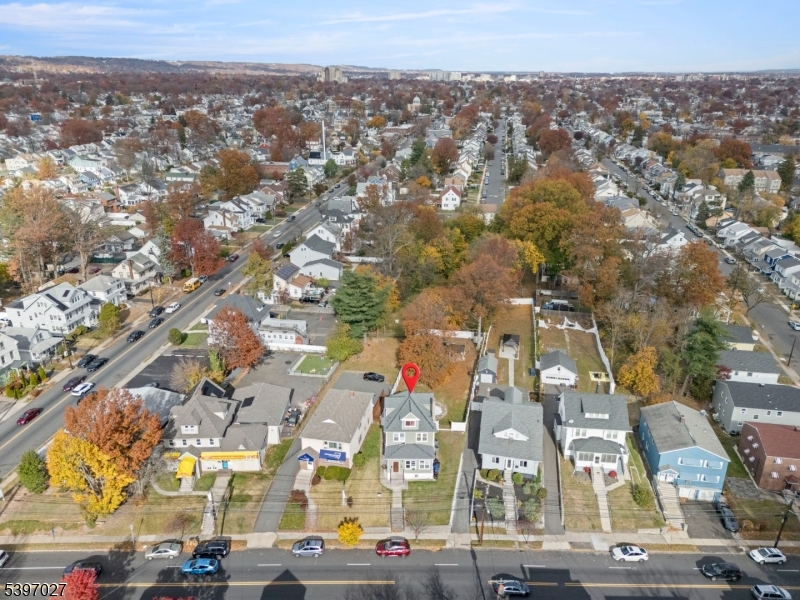 1371 Clinton Avenue Irvington, NJ 07111 - Photo 1 of 41 an aerial view of residential houses with outdoor space
