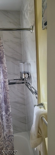 1371 Clinton Avenue Irvington, NJ 07111 - Photo 39 of 41 a bathroom with a bathtub