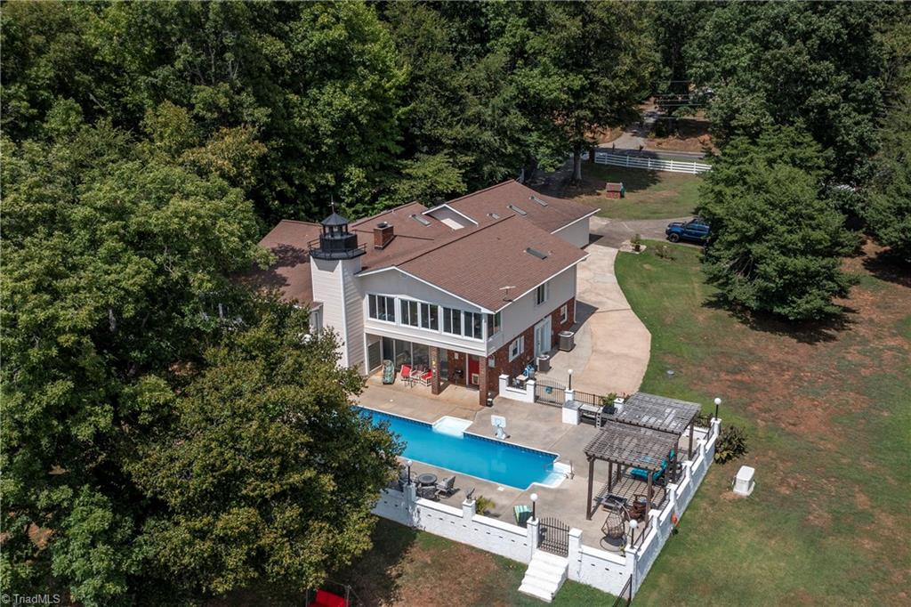 2164 Beckner Road Lexington, NC 27292 - Photo 11 of 50 Main level circular drive or drive all the way down to the pool area.