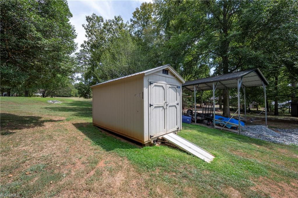 2164 Beckner Road Lexington, NC 27292 - Photo 15 of 50 Outbuildiing remains as well as the RV Carport