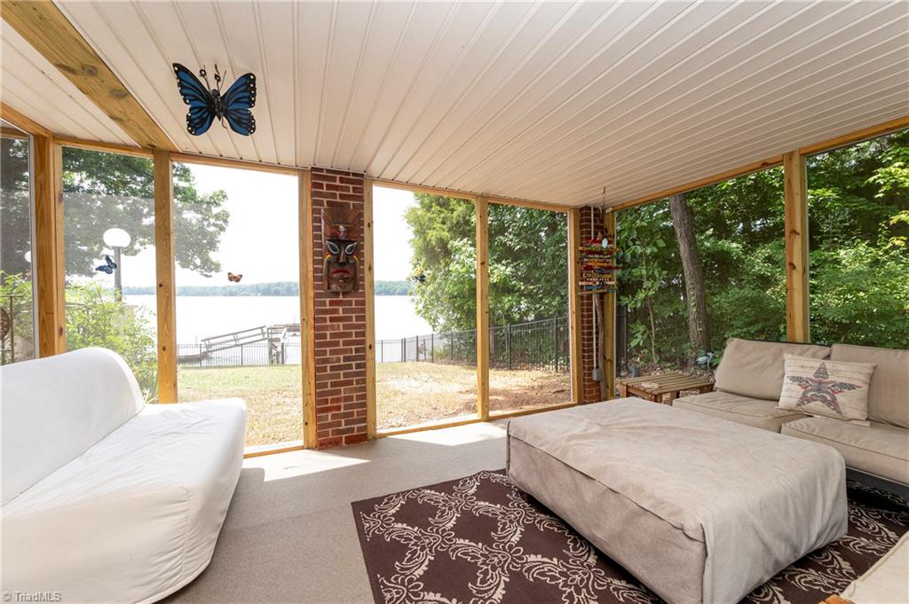2164 Beckner Road Lexington, NC 27292 - Photo 29 of 50 Screened porch by the pool area