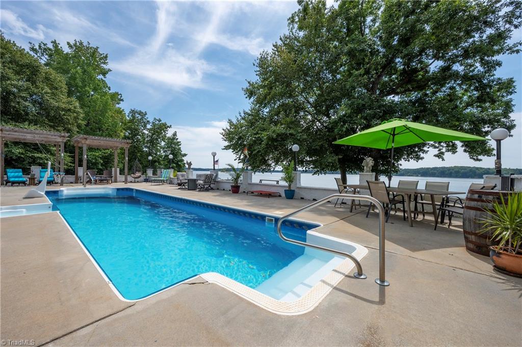 2164 Beckner Road Lexington, NC 27292 - Photo 7 of 50 There is an outdoor kitchen by the pool.