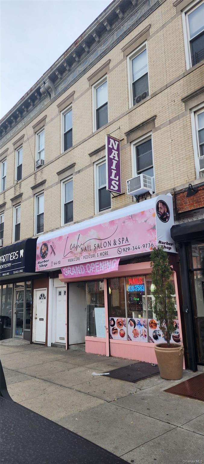64-10 Myrtle Avenue Queens, NY 11385 - Photo 2 of 15 a view of a cafe with sitting area