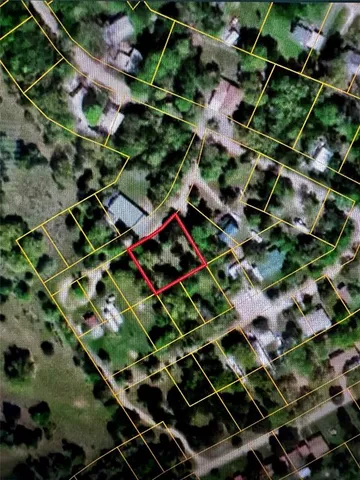 an aerial view of a house with a ocean view