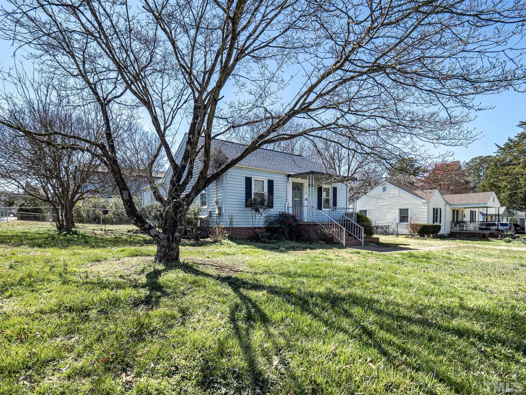 716 Hamilton Road Raleigh, NC 27604 - Photo 2 of 15 a front view of a house with a yard