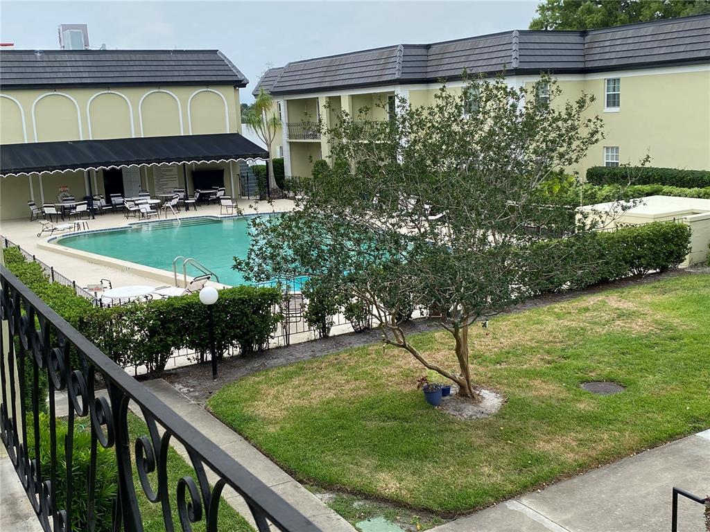 1500 Gay Road, Unit 17D Winter Park, FL 32789 - Photo 22 of 34 a view of a swimming pool and outdoor seating