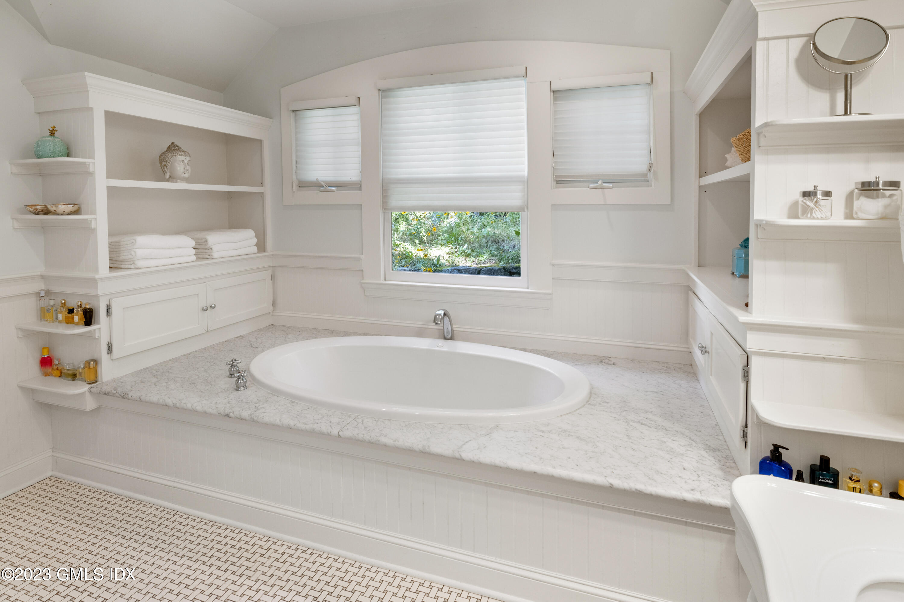284 Riversville Road Greenwich, CT 06831 - Photo 17 of 34 a bathroom with a tub sink and a window
