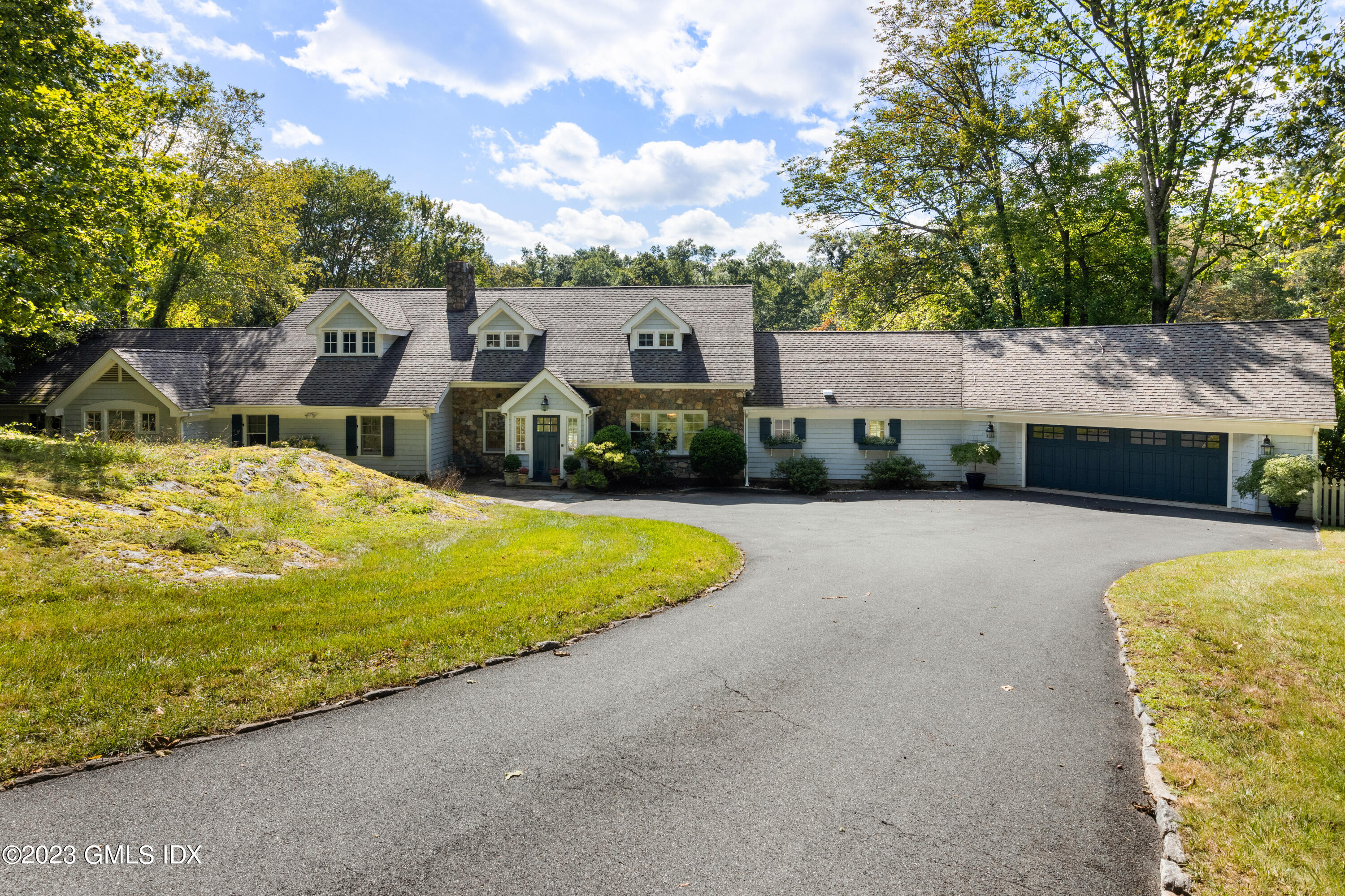 284 Riversville Road Greenwich, CT 06831 - Photo 2 of 34 a view of swimming pool with a garden