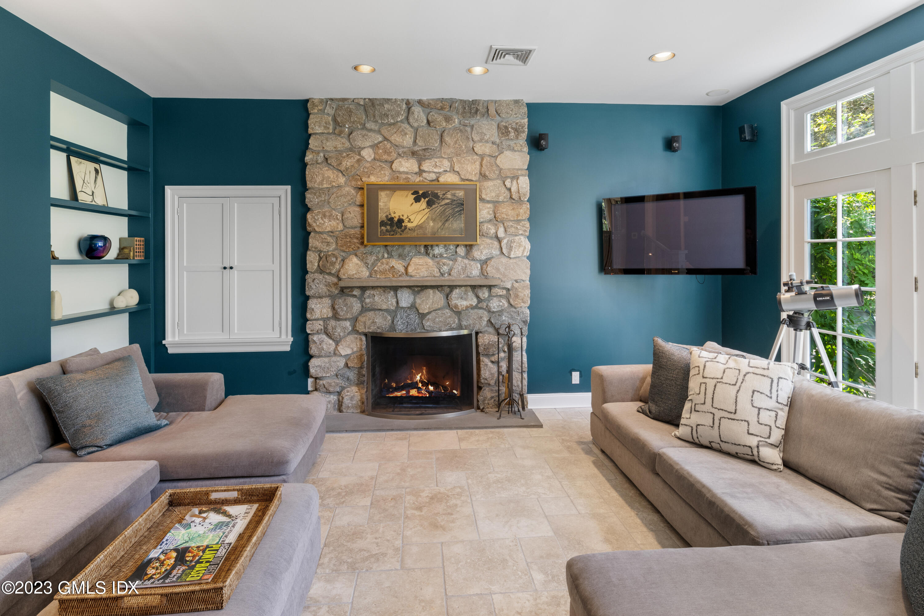 284 Riversville Road Greenwich, CT 06831 - Photo 4 of 34 a living room with furniture and a fireplace