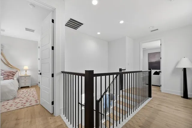 a view of hallway with mirror