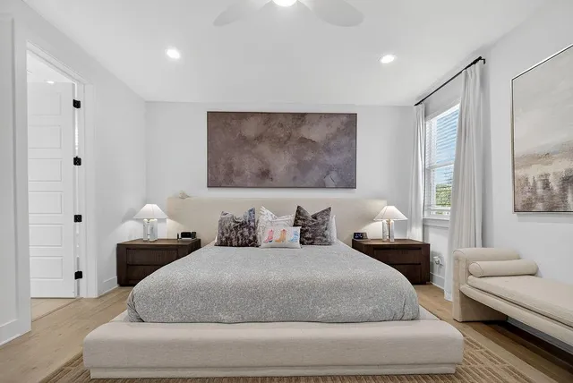 a bedroom with a bed and a couch