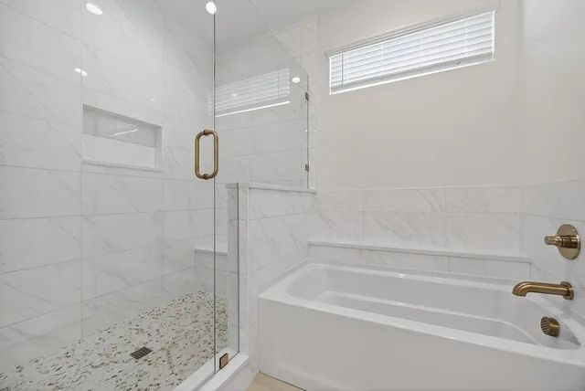 a bathroom with a bath tub