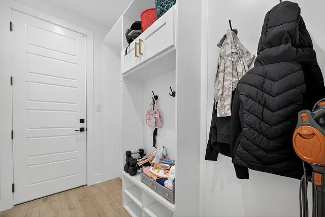 a living room with furniture and a gate