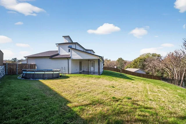 a house view with a garden space