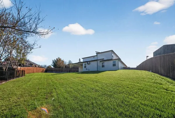 a house view with a garden space