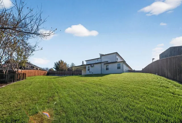 a house view with a garden space