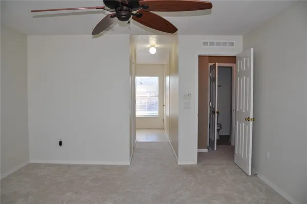 a view of a hallway with a closet