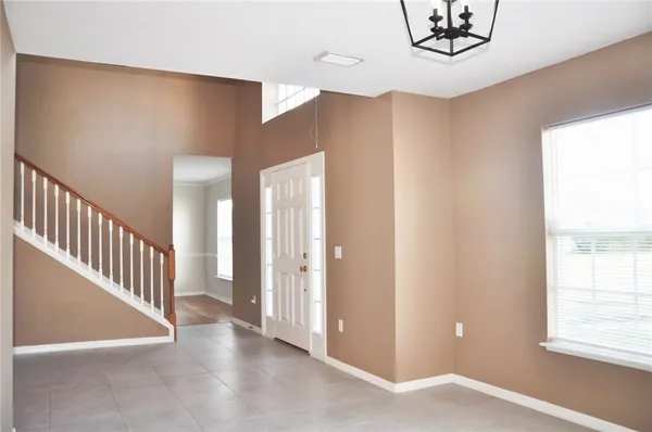 a view of a hallway with entryway