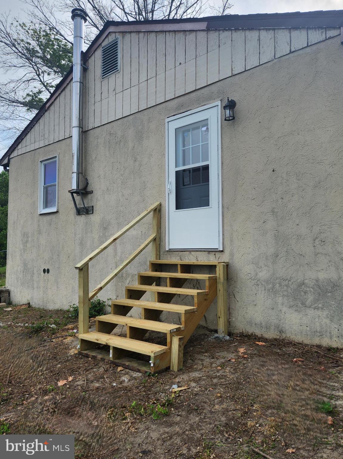 403 Rose Street Salisbury, MD 21801 - Photo 26 of 35 Charming entryway with new wooden steps.