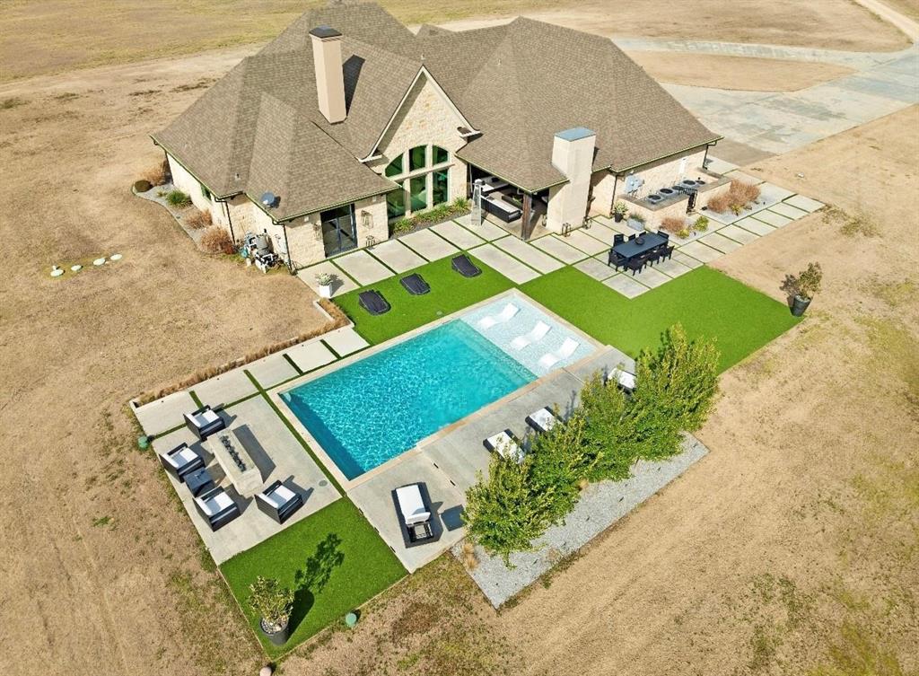 2106 County Road Paris, TX 75462 - Photo 30 of 40 swimming pool with couple of relaxing chair