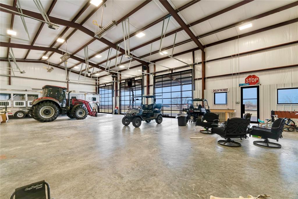 2106 County Road Paris, TX 75462 - Photo 39 of 40 a view of a garage with a car parked in it
