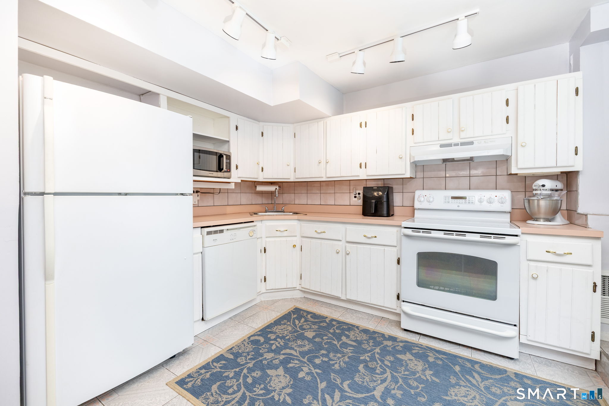 182 Osborn Road Naugatuck, CT 06770 - Photo 23 of 39 Lower lever additional kitchen-sliders to backyard