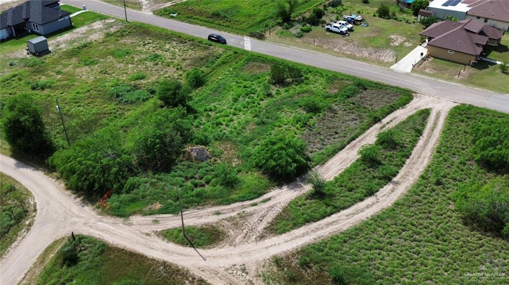 1049 River Bend Street Rio Grande City, TX 78582 - Photo 2 of 2 an aerial view of residential house with outdoor space and street view