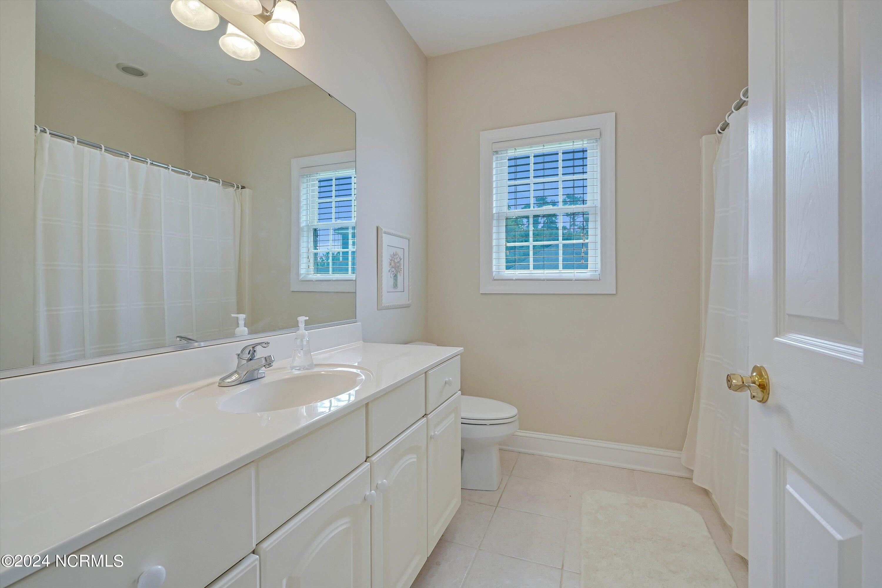 160 Rice Mill Circle Sunset Beach, NC 28468 - Photo 24 of 54 guest bath
