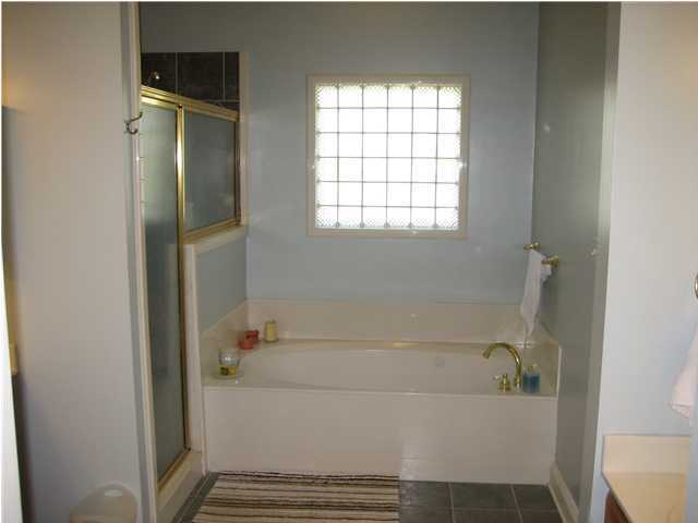 3851 Mesa Road Destin, FL 32541 - Photo 12 of 20 a bathroom with a bathtub