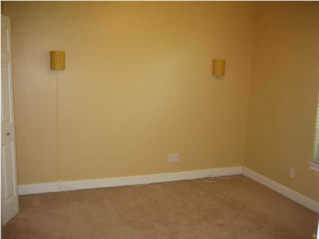 3851 Mesa Road Destin, FL 32541 - Photo 15 of 20 a view of an empty room with a door