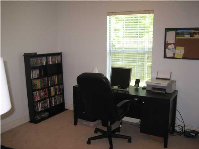 3851 Mesa Road Destin, FL 32541 - Photo 16 of 20 a view of a workspace with furniture and a window