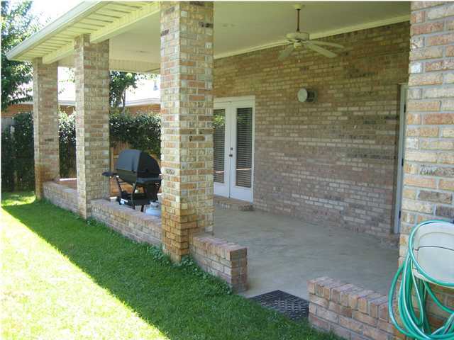 3851 Mesa Road Destin, FL 32541 - Photo 19 of 20 a bathroom with a sink a toilet and shower
