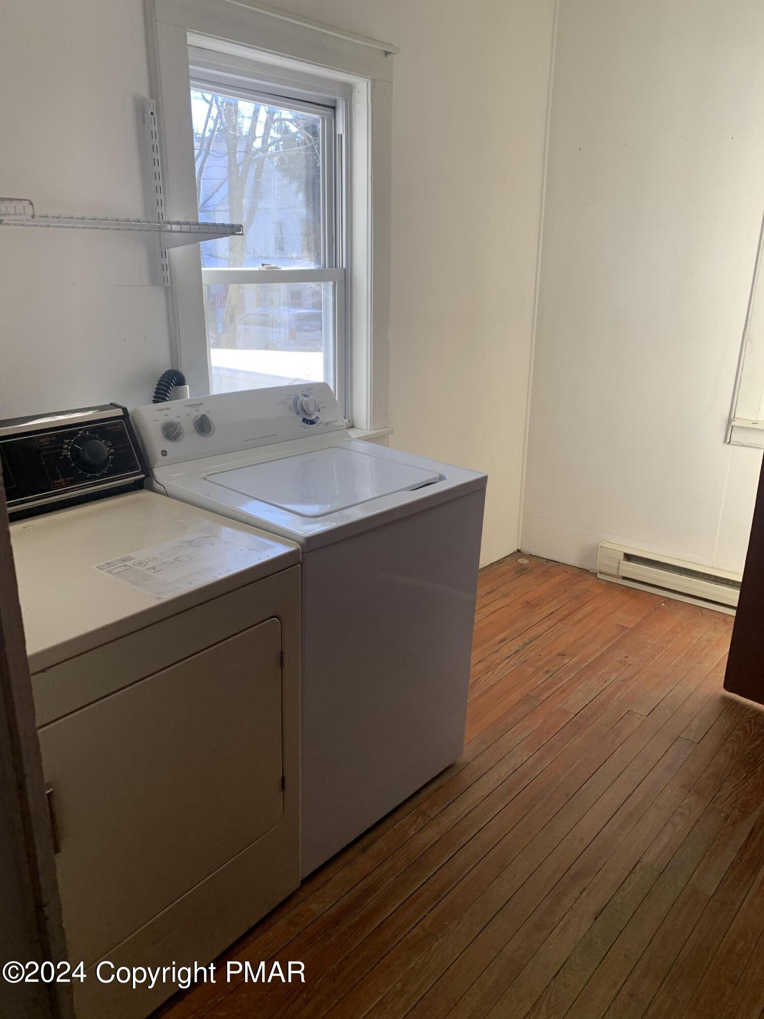 28 Reeder Street Mount Pocono, PA 18344 - Photo 14 of 17 a room with wooden floor and window